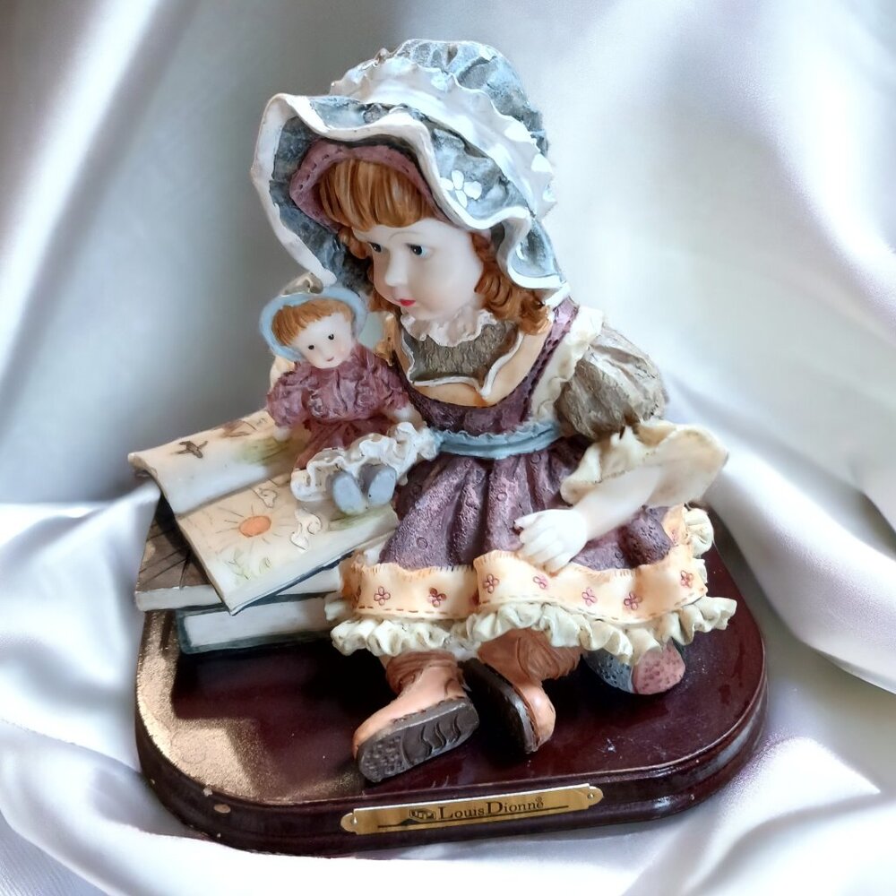 Louis Dionne Vintage Collectible Resin Figurine: "Girl Reading to Her Dolly"
